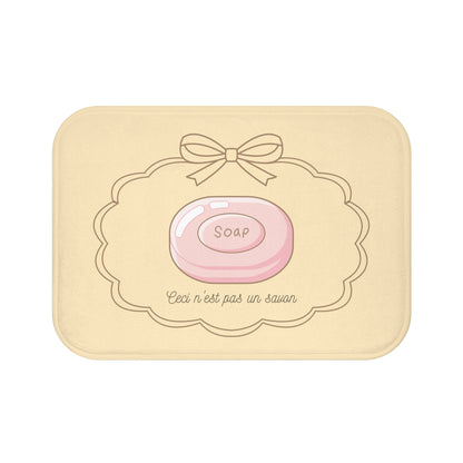 René Magritte 'Ceci n'est pas un savon' Bath Mat, NEUTRAL | Surrealist Humor Decor